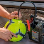 J7CV product in use inflating a soccer ball